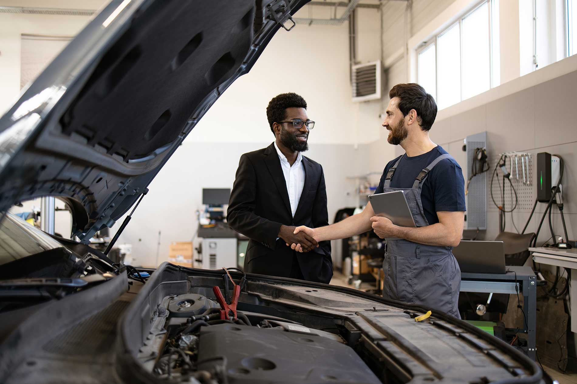 technician-talking-to-a-man-in-a-suit